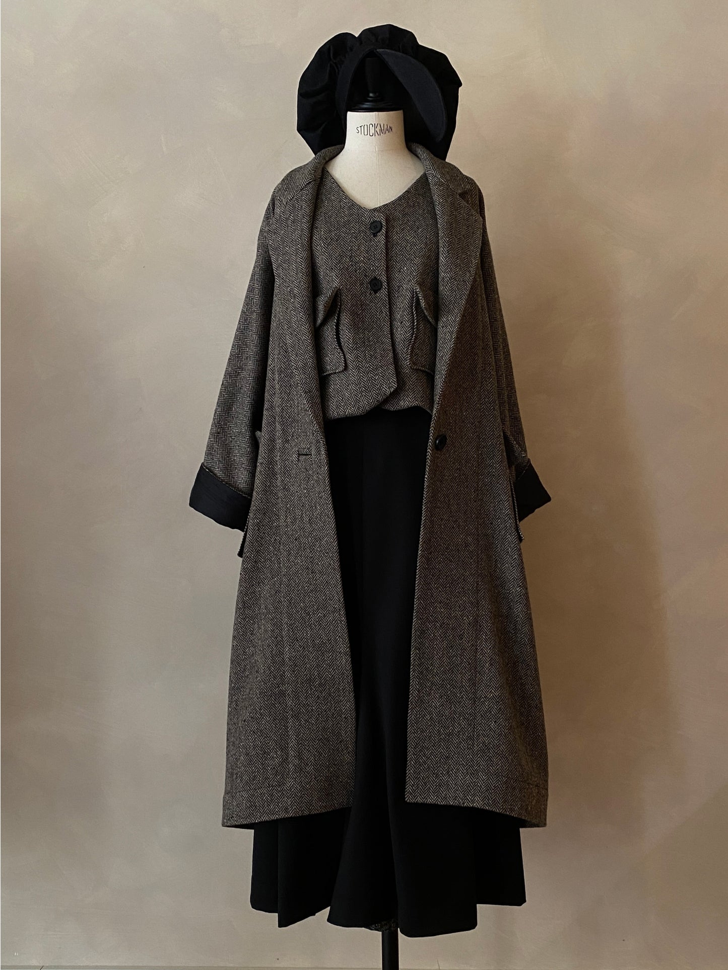 Oversized grey herringbone wool coat