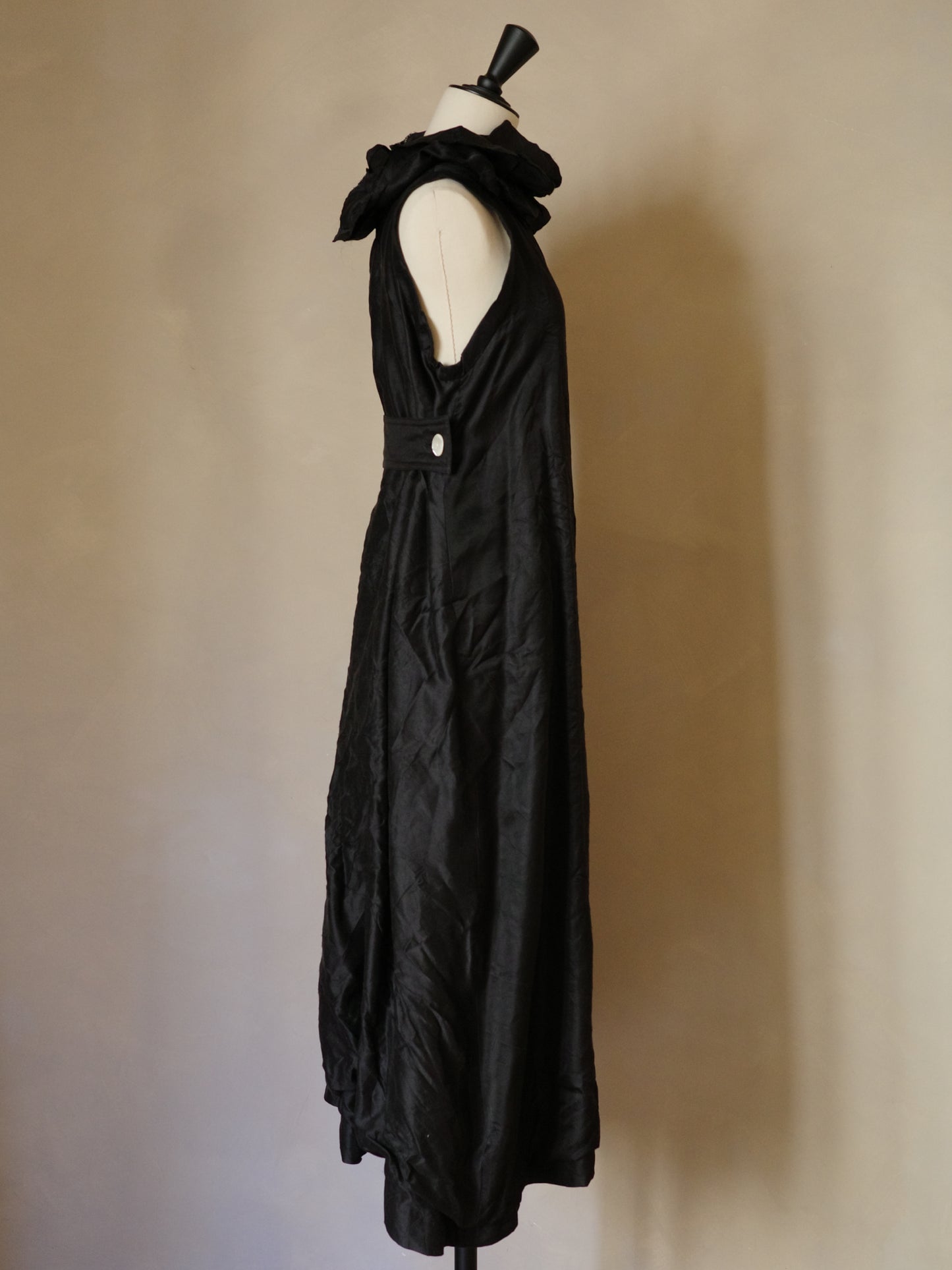 Sleeveless black silk dress