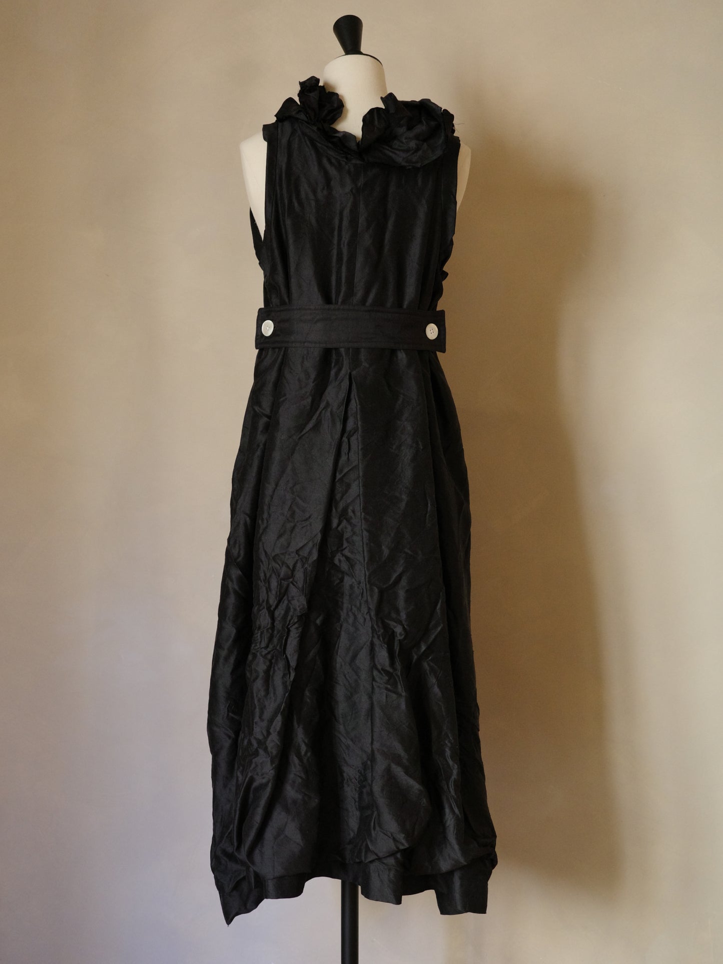 Sleeveless black silk dress